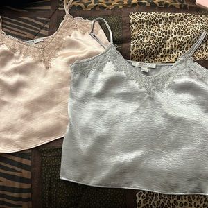 1 cream and 1 silver night top. Cream size- S and silver size- M